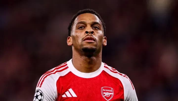 Arsenal player in red jersey during match