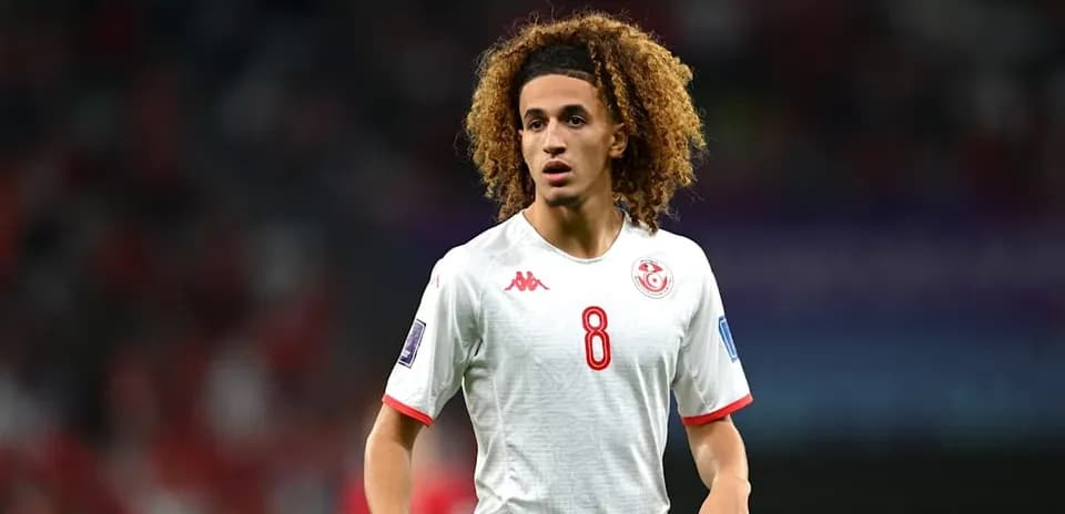 Player wearing Tunisia kit during a match