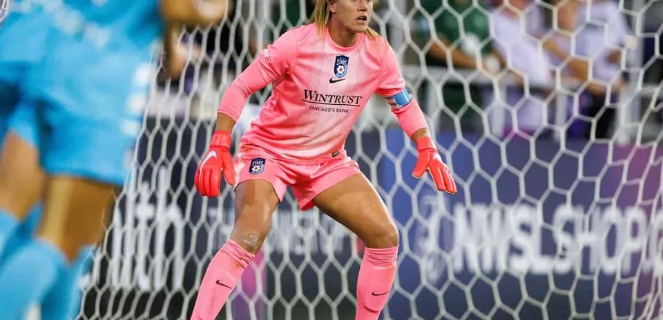 Goalkeeper preparing for play during match