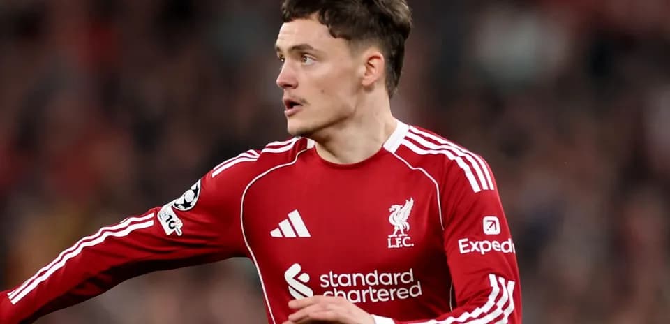 Player in Liverpool FC kit during match action