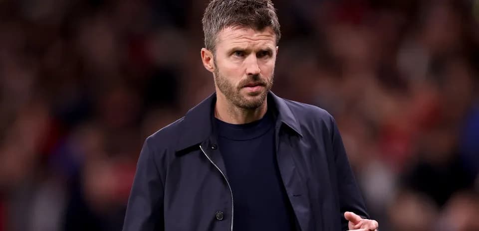 Coach walking on the sidelines during a match