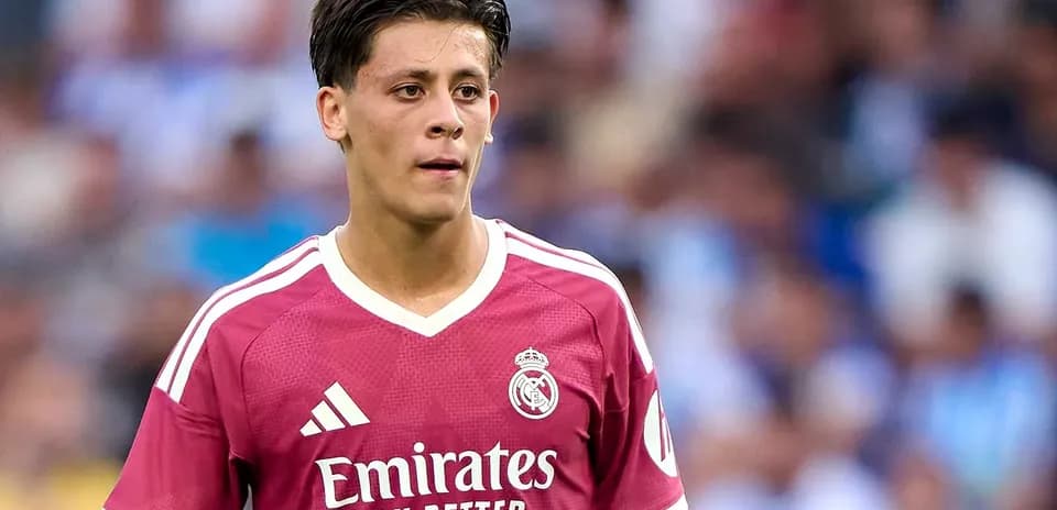 Player in pink Real Madrid kit during match