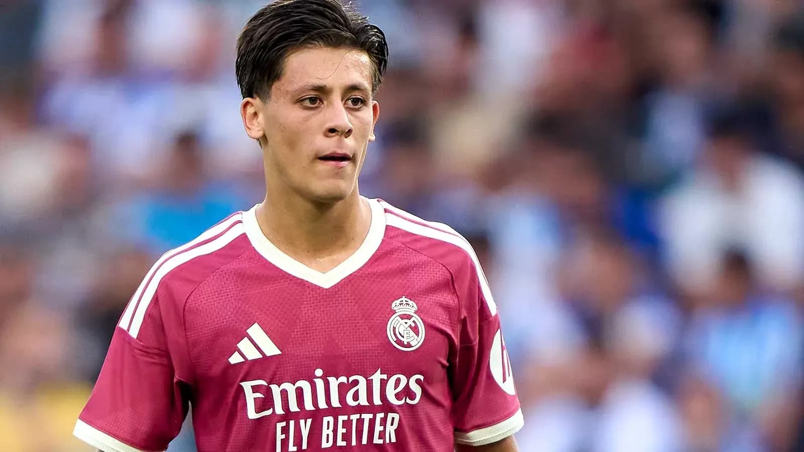 Player in pink Real Madrid kit during match