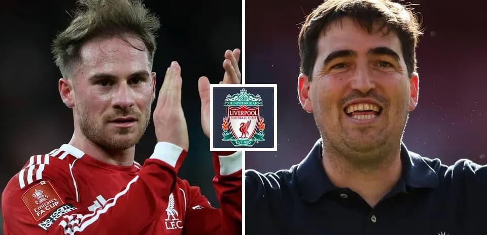 Two Liverpool players celebrating with club logo