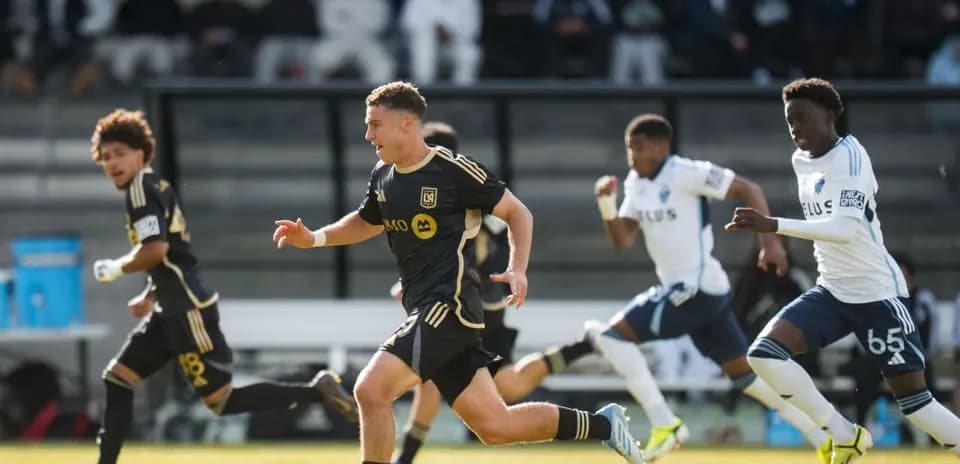 Players competing during Town vs Vancouver Whitecaps II match