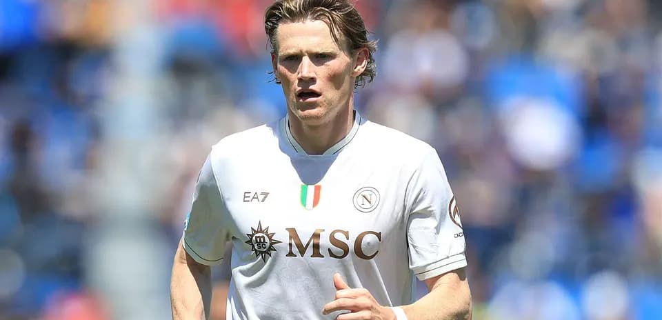 Player in Napoli kit running on the field