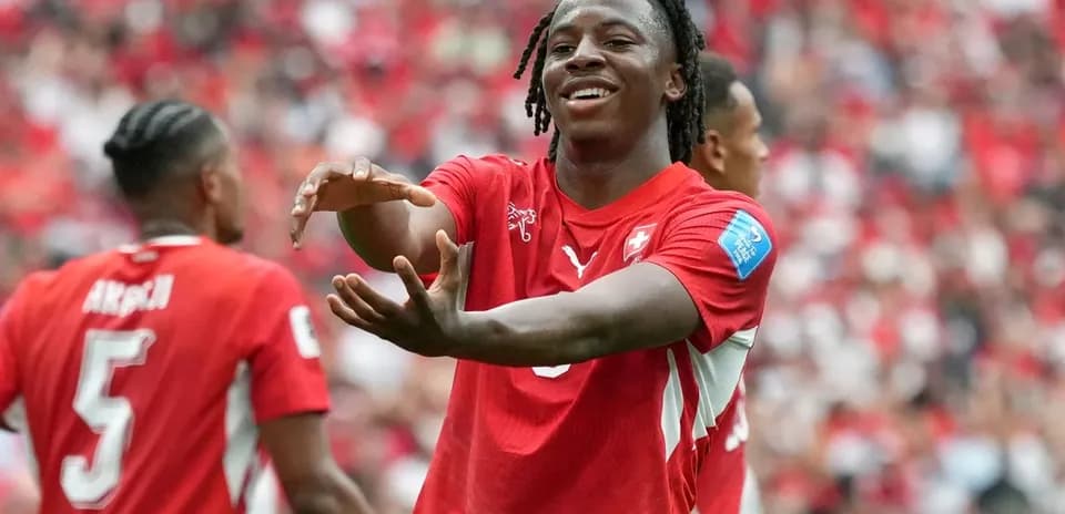 Player celebrating with teammates during a match