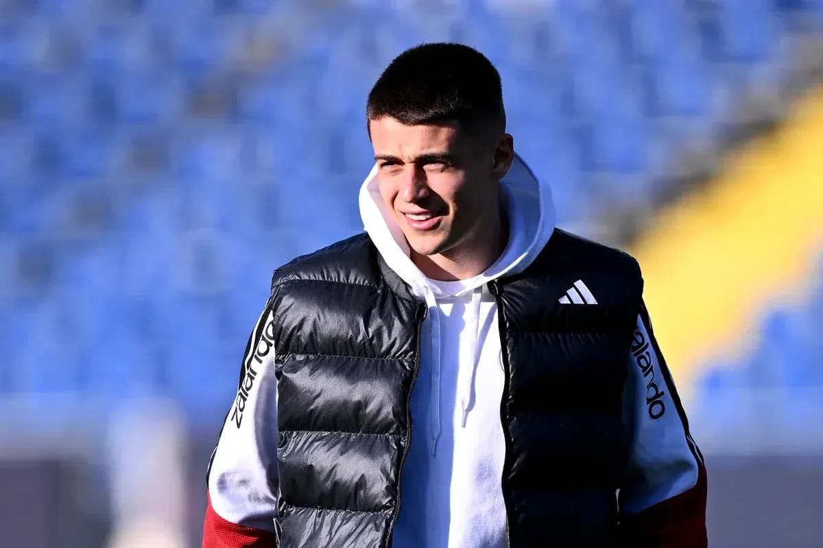 Player in a puffer vest at stadium