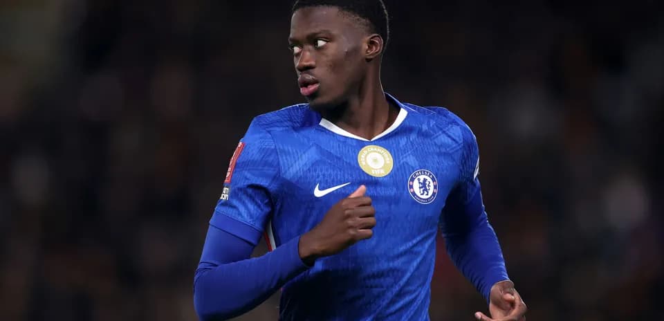 Chelsea player running during a football match