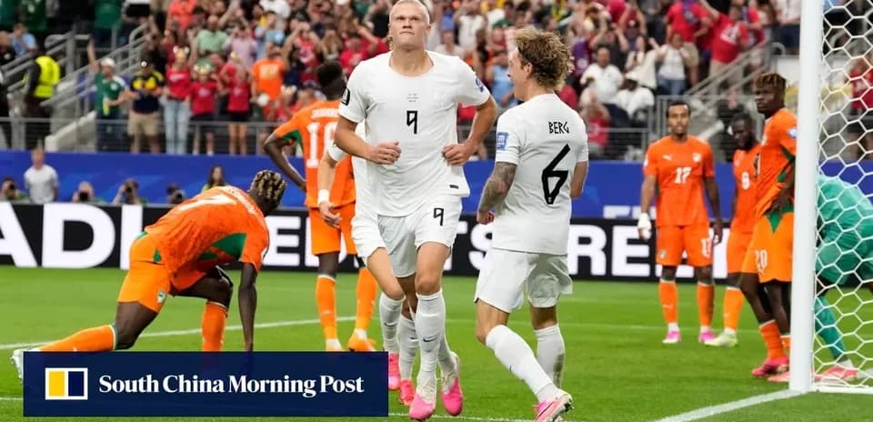 Players celebrating a goal during a football match