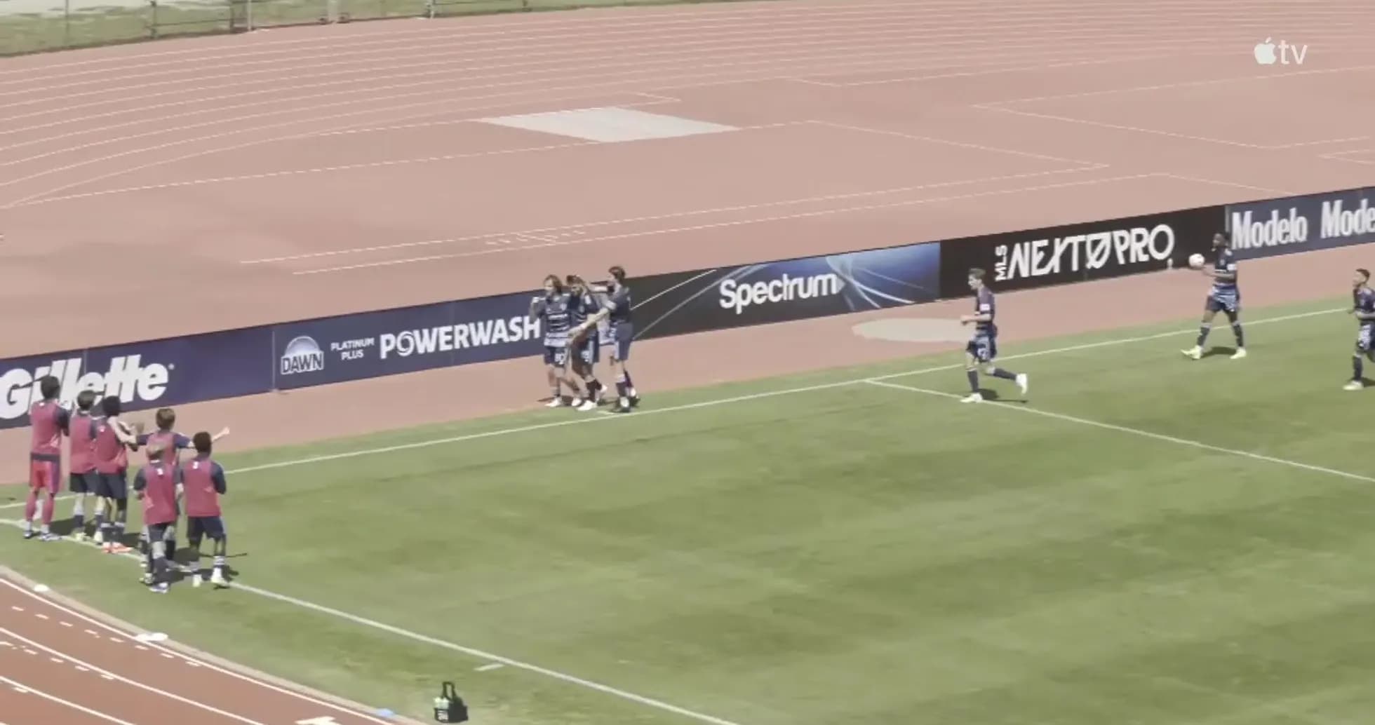 Players celebrating a goal during MLS Next Pro match