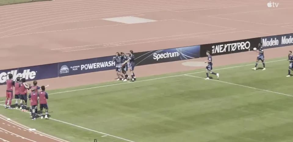 Players celebrating a goal during MLS Next Pro match