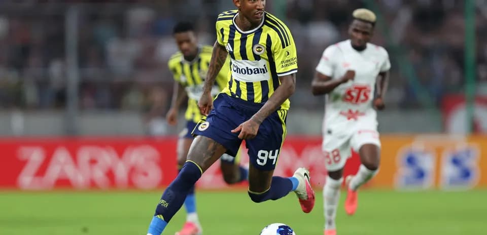 Fenerbahçe player dribbling during match