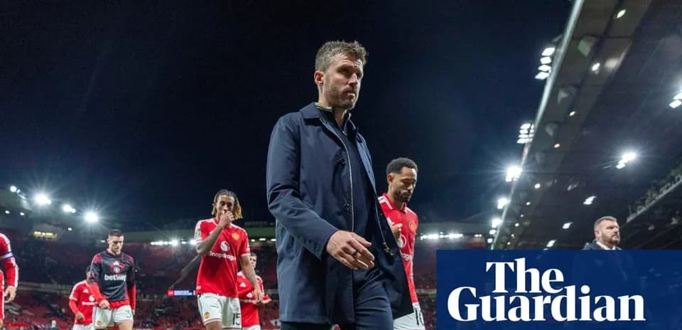 Manager and players walking off the pitch after match