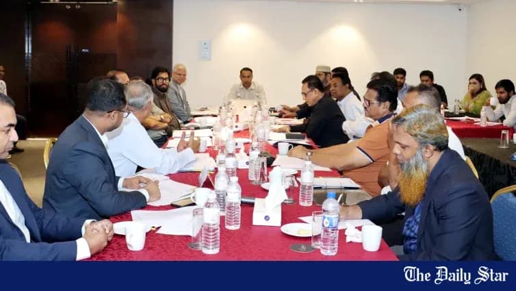 Meeting with participants seated around a large table