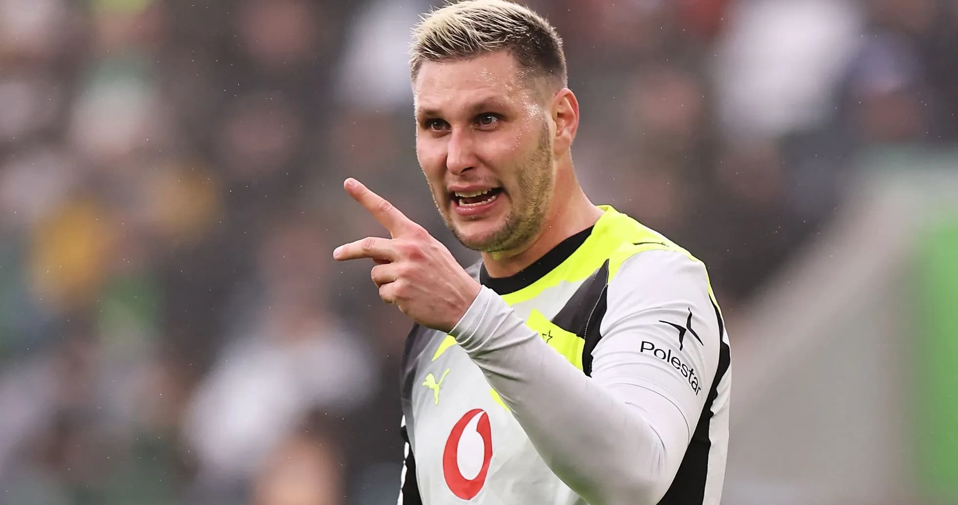 Goalkeeper gesturing during a match