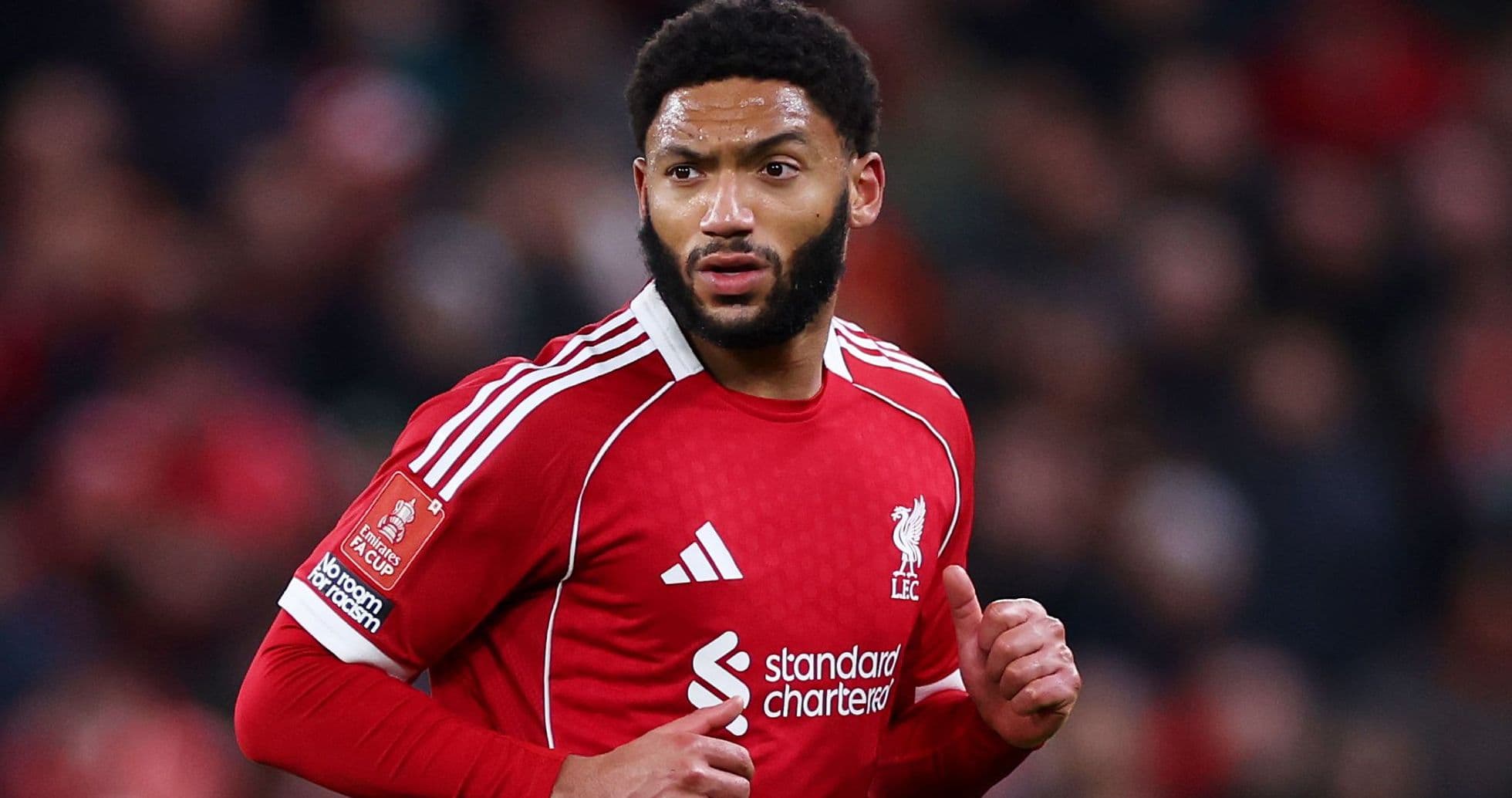 Player in Liverpool kit during match action