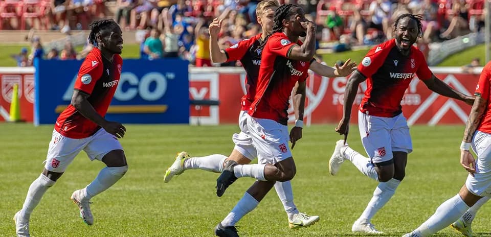 Cavalry FC players celebrating a goal