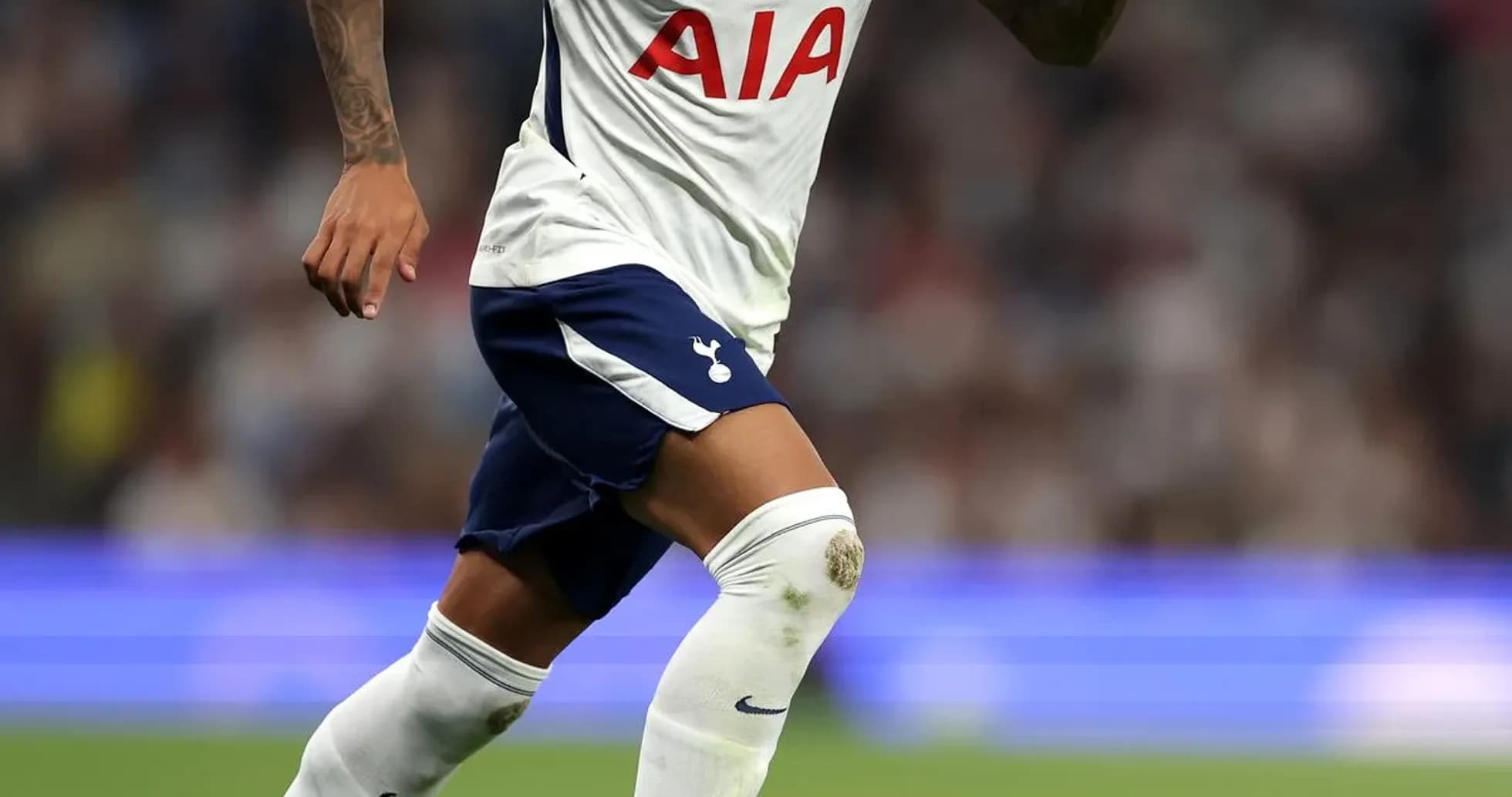 Player running with ball during Tottenham match