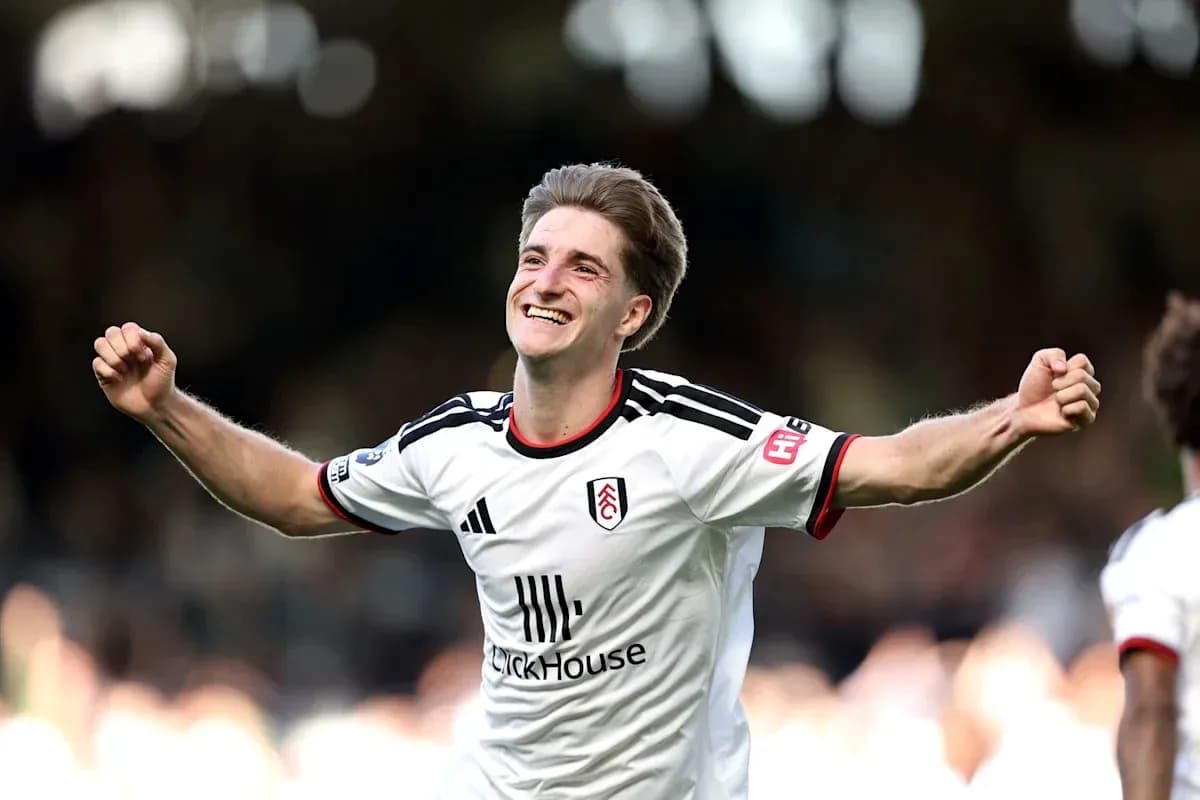 Fulham player celebrating a goal on the field