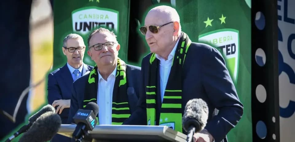 Officials speaking at Canberra United press conference