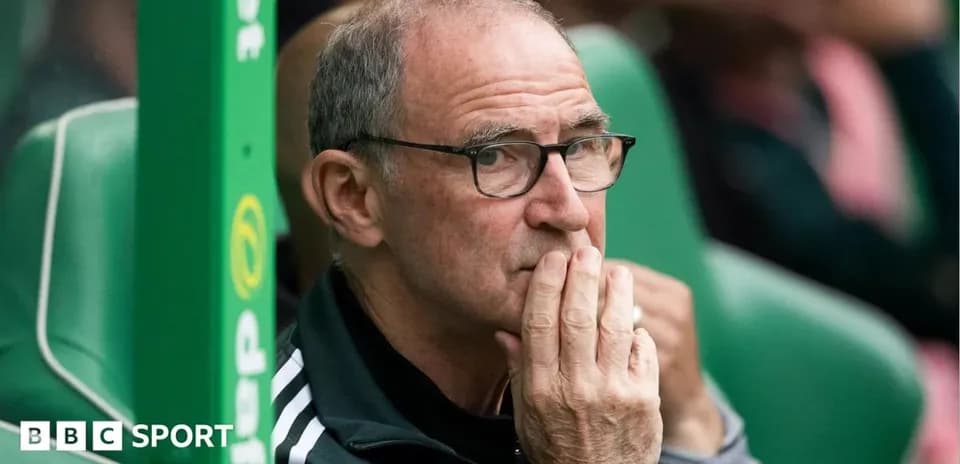 Manager observing from the sidelines during match