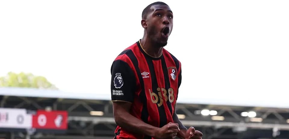 Bournemouth player celebrating a goal on pitch