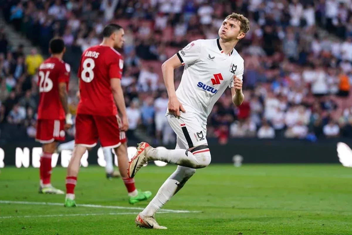 Player celebrating after scoring a goal during match