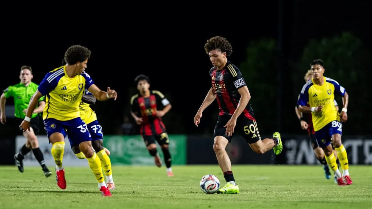 Atlanta United II player dribbling against Orlando City II