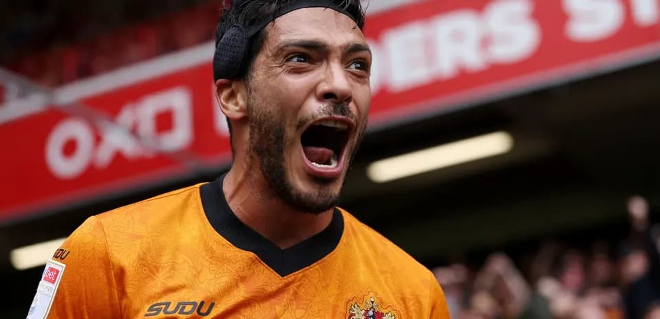 Player celebrating enthusiastically after scoring a goal
