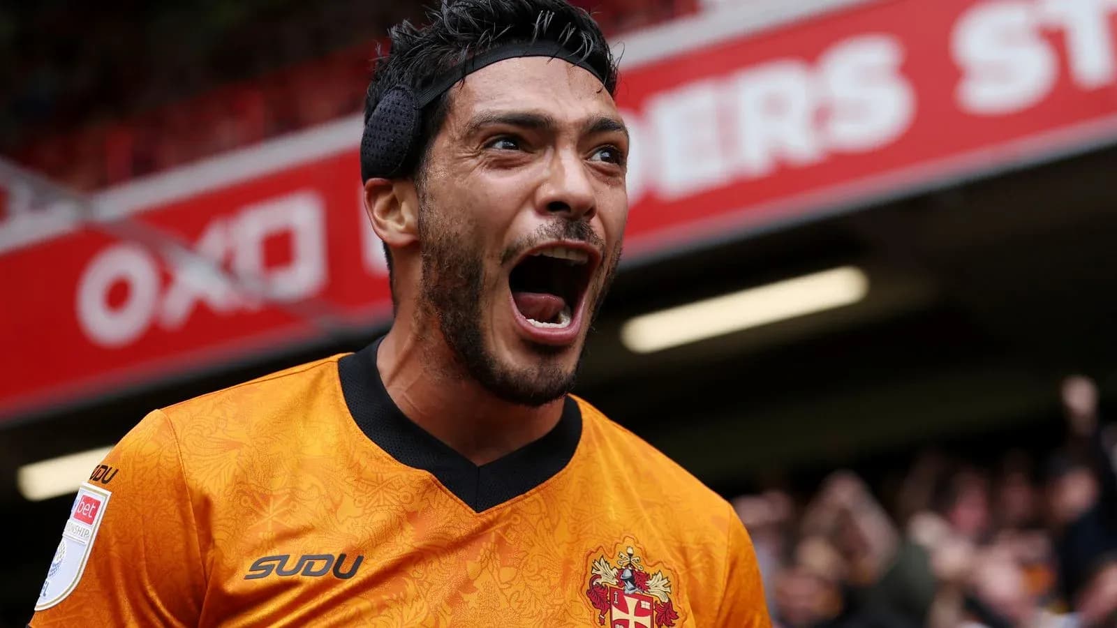 Player celebrating enthusiastically after scoring a goal