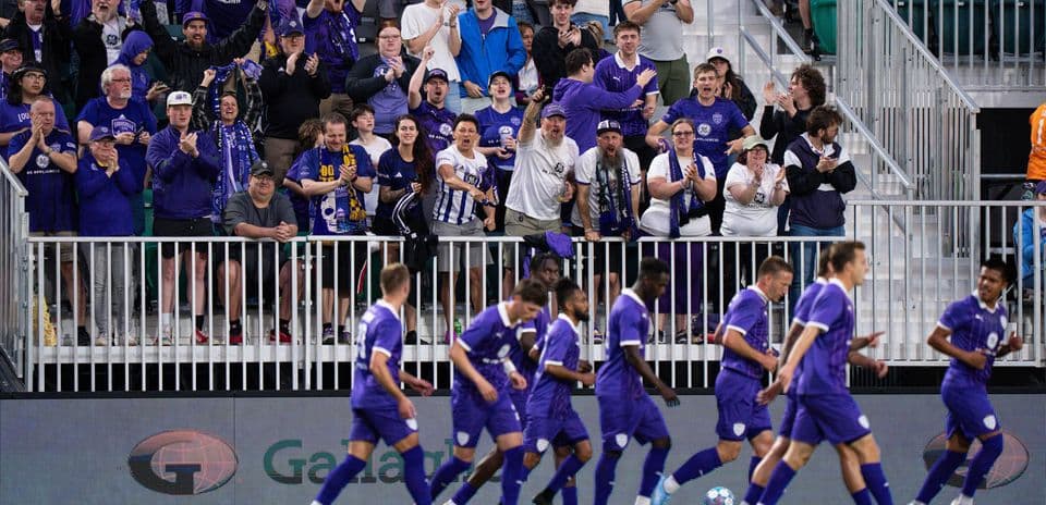 Louisville City FC fans celebrating at the match