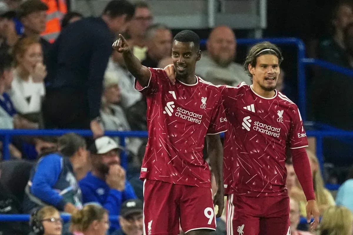 Liverpool players celebrating a goal on the pitch