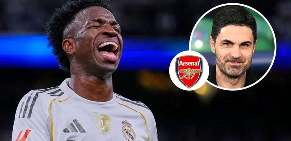 Vinicius Jr. celebrating with Real Madrid logo