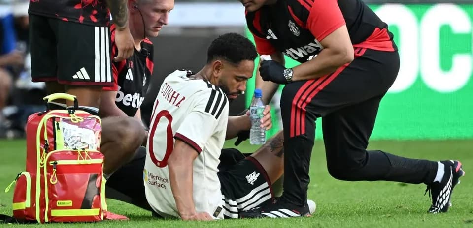 Player receiving medical attention on the field
