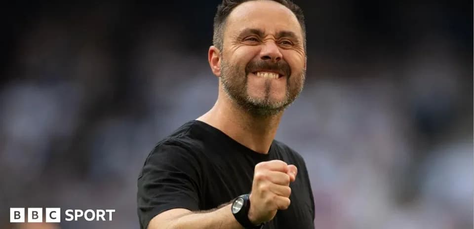 Coach celebrating victory with a clenched fist