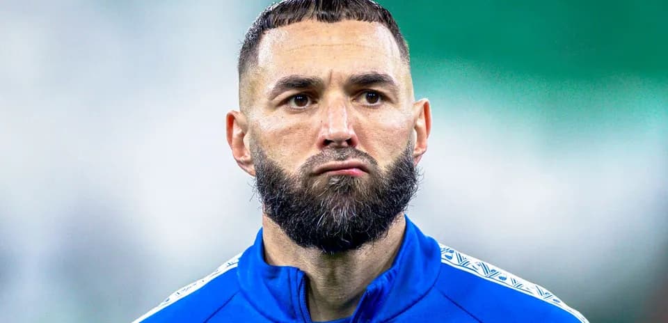 Football player in blue jersey during training session