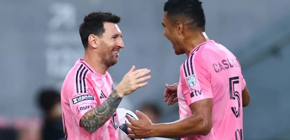 Players celebrating during a soccer match