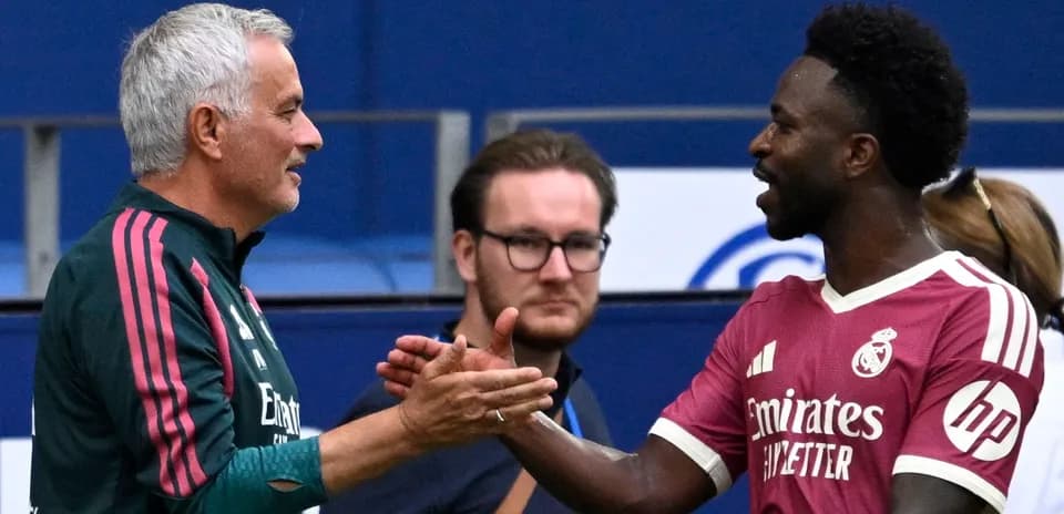 Coaches shaking hands before a match