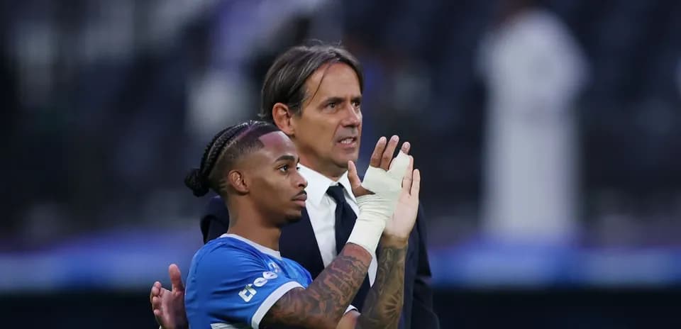 Player and coach interacting after the match