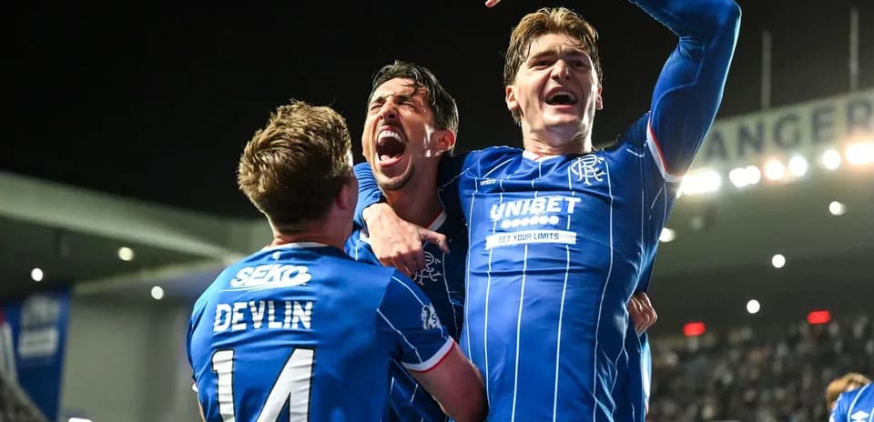 Rangers players celebrating a goal during match
