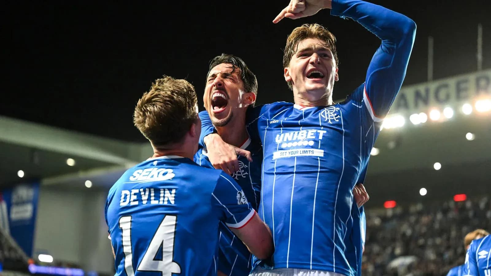 Rangers players celebrating a goal during match