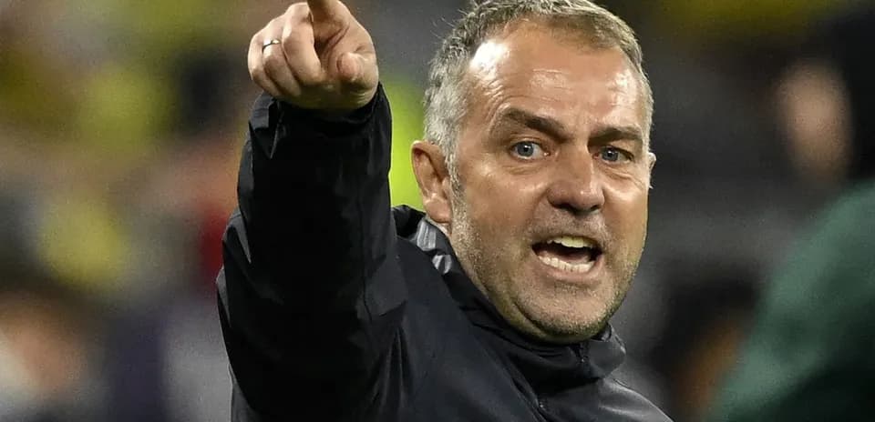 Coach gesturing and shouting during a match