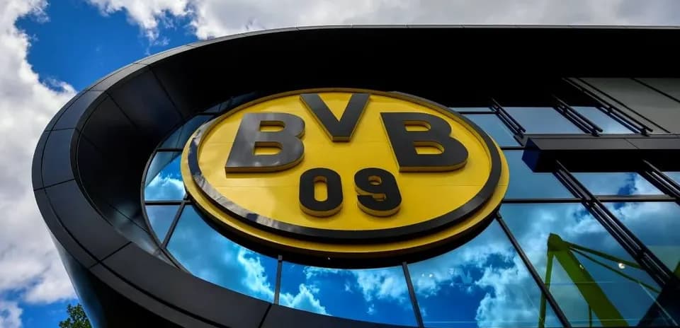 Borussia Dortmund logo on modern building exterior
