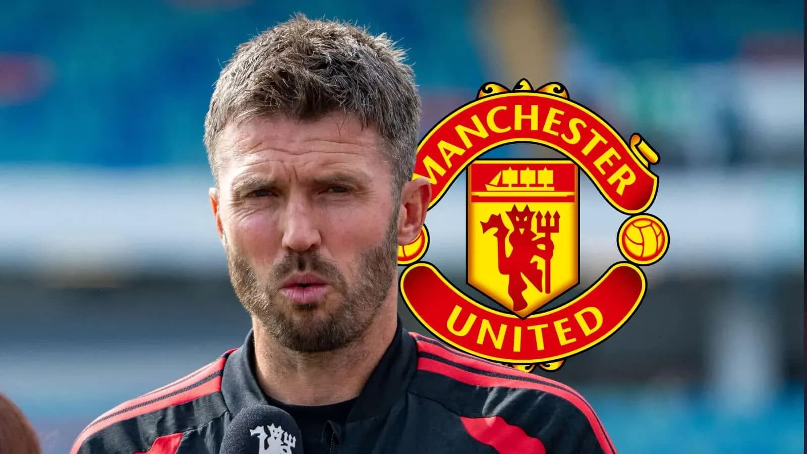 Coach speaking during press event with Manchester United logo