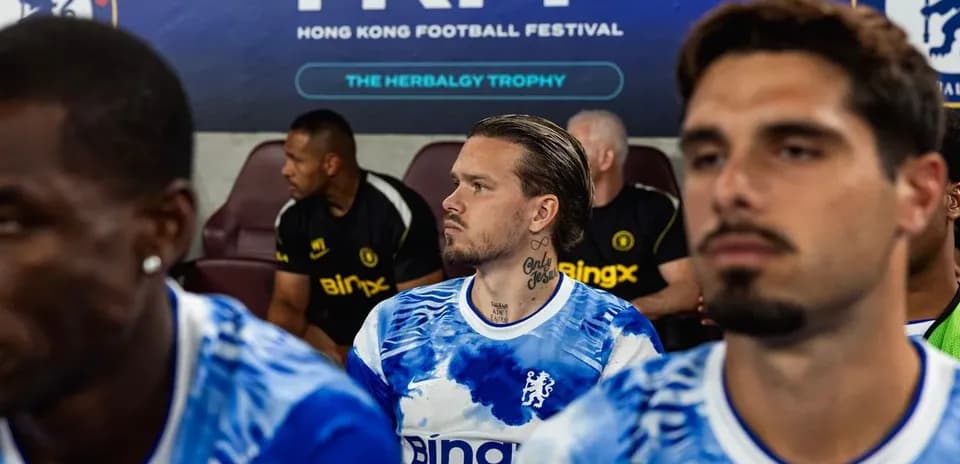 Players sitting on bench during Hong Kong Football Festival