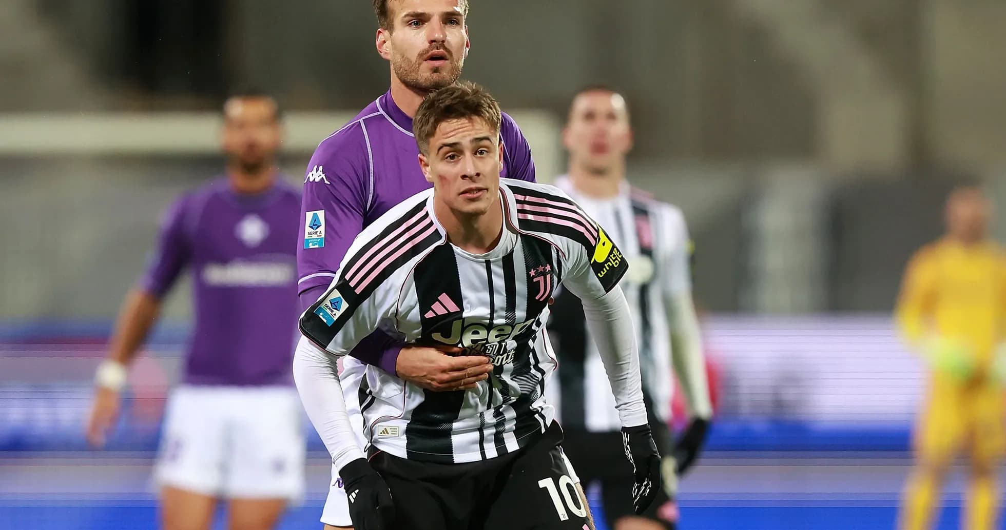 Juventus player being challenged during match
