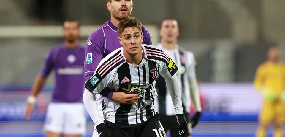 Juventus player being challenged during match