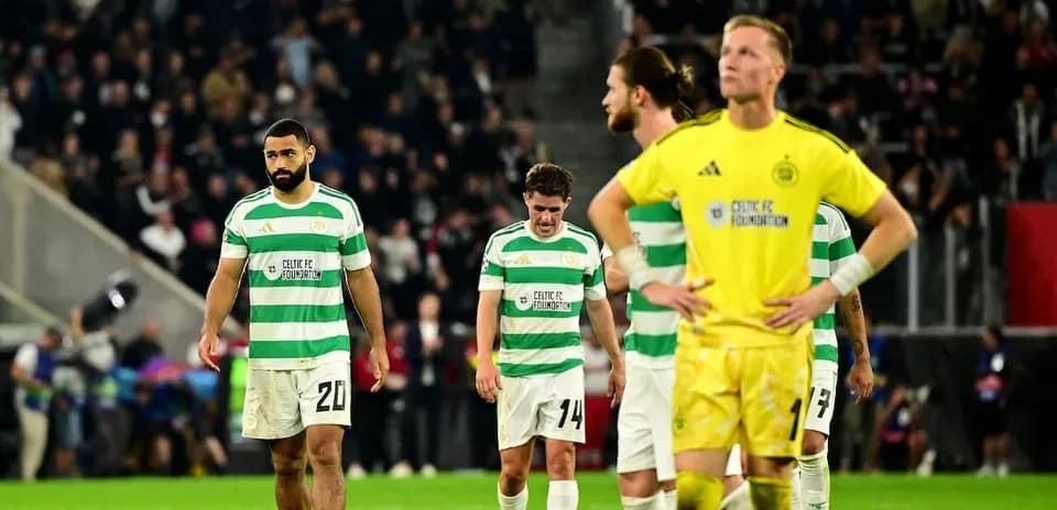 Celtic players walking off the pitch after match