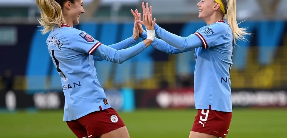 Players celebrating during Manchester City W match